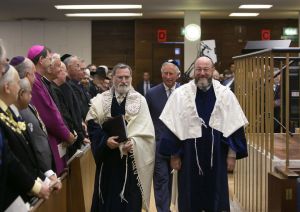 Outgoing chief rabbi Jonathan Sacks (left), walking with Ephraim Mirvis (right) and Prince Charles (behind them in center). (photo credit: Yakir Zur)